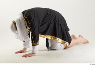 Arthur Fuller Sultan Bowing bowing kneeling whole body 0003.jpg
